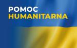 kolory flagi ukraińskiej, niebieski na górze i żółty na dole. NA niebieskim tle biały napis pomoc humanitarna